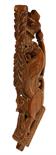 A CARVED INDIAN TEAK TEMPLE WALL BRACKET, 19th century, decorated with stylised elephant, 22.75in (