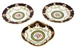 A PAIR OF ATTRACTIVE SPODE PORCELAIN BOWLS, each decorated with panels of flowers, inside a shaped