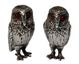 A PAIR OF UNUSUAL TIFFANY STERLING SILVER NOVELTY SALT AND PEPPER CASTERS, each modelled as an owl