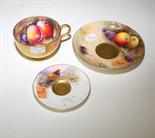 A ROYAL WORCESTER FRUIT DECORATED TEA CUP, 
signed W Hale, a matching saucer, signed by the artist