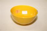 A CARVED YELLOW GROUND CHINESE PORCELAIN BOWL, 
with blue seal  mark to base, chip to rim, 5in (