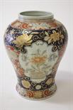 A LARGE BALUSTER SHAPED JAPANESE IMARI VASE, 
O.R.M., decorated with various flowers and leaf