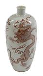 A CHINESE PORCELAIN VASE, 
decorated with two five claw dragons, against a white background, under a