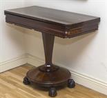 AN EARLY VICTORIAN FOLD-OVER ROSEWOOD CARD TABLE, 
the rectangular top with rounded corners above