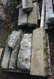 NINE ASSORTED EARLY GRANITE STEPS OR LINTELS,
various sizes, the largest 43in (109cm), on two