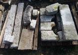 A QUANTITY OF MISCELLANEOUS CUT GRANITE,
comprising a pair of gate pillars or posts, various arches,