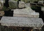 A QUANTITY OF CUT GRANITE SECTIONS, including a pair of large heavy corbels, various sizes (