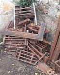 A LARGE QUANTITY OF OLD CAST IRON FIRE GRATES, BASKETS, ETC. (A lot)