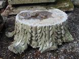 A LIMESTONE LEAF-CARVED PILLAR CAPITAL, 43in (109cm) high, approx. (1)