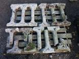 A QUANTITY OF GOTHIC STYLE CUT GRANITE BALUSTRADE SECTIONS, some as is. (7)