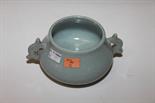 A TWO-HANDLED LIGHT BLUE CRACKLEWARE GLAZED STONEWARE BOWL, 
with two shaped and pierced handles,