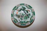 A CHINESE FAMILLE VERTE STEM BOWL, 
decorated with figures and a deer on a balcony, with four-