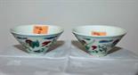 A PAIR OF SMALL CHINESE PORCELAIN BOWLS, 
each decorated with flying cranes, six-character seal mark