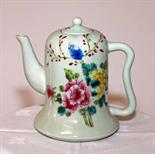 A CHINESE FAMILLE ROSE BELL-SHAPED TEAPOT AND COVER 
decorated with flowers, 6in (15cm). (1)