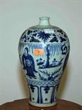 A CHINESE BLUE AND WHITE STONEWARE BALUSTER VASE, 
decorated with figures in a landscape in an all-