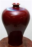 A CHINESE SANG DE BOEUF MEIPING VASE,
of baluster form, with flambé glaze to shoulder, 12in (