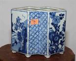 A CHINESE BLUE AND WHITE DOUBLE DIAMOND SHAPED VASE, 
the panels decorated with figures in