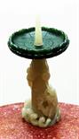 AN 18TH CENTURY CARVED SPINACH JADE CANDLE STICK DRIP TRAY, 
in the form of a lotus leaf, on a later