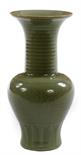 A CHINESE CELADON GROUND GLAZED POTTERY GU VASE, 
with a lotus leaf base and a flared neck, 13.