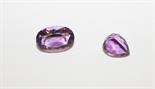 A HEART SHAPED UNMOUNTED AMYTHEST GEM STONE,
5.16ct; together with another oval ditto, 12.55ct. (2)