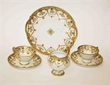 AN ATTRACTIVE TWENTY-FOUR PIECE NORITAKE JAPANESE PORCELAIN TEA SERVICE, 
decorated with gilt and