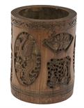 A 19TH CENTURY CHINESE CARVED BAMBOO BRUSH POT, carved in deep relief with numerous figures