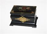 A VERY ATTRACTIVE MOTHER-O-PEARL INLAID AND FLORAL DECORATED PAPIER MACHE TEA CADDY,
of