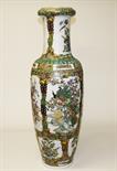 A LARGE MODERN CHINESE FAMILLE ROSE VASE, 
profusely decorated with colourful flowers, peacocks,