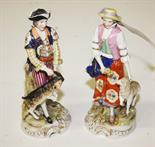 A PAIR OF CONTINENTAL PORCELAIN GROUPS,
one depicting a man with goat, the other, a woman with lamb,