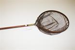AN OLD BRASS MOUNTED HARDY SALMON NET.
65in (165cm)l. (1)
