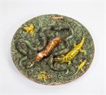 A VERY LARGE FRENCH PALISSY STYLE TROMPE L'OEIL DISH,
19th century, with impressed monogram mark