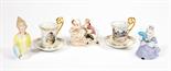 A 10 PIECE PART LIMOGES PORCELAIN COFFEE SERVICE, 
some cups with portraits of Napoleon in transfer;