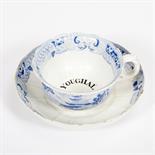 A RARE YOUGHAL WESLEYAN SOCIETY BLUE AND WHITE CUP AND SAUCER, 
19th century, inscribed on both. (