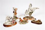 A NAPLES PORCELAIN FIGURE
modelled after a young peasant boy with ducks, 7in (18cm); another similar