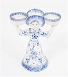 A BLUE AND WHITE DUTCH DELFT SALT STAND, 
modelled as a double faced woman, holding two small bowls,