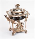 A 19TH CENTURY SHEFFIELD PLATED TWO HANDLED TEA URN,
with shell and foliate finial on domed lid with