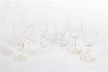 A SET OF FIVE CRYSTAL WINES, 
probably Waterford; a set of three similar champagnes; and a set of