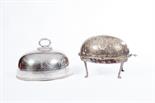 A VICTORIAN OVAL AND SILVER PLATED CRESTED DISH COVER,
with reeded handle, 12in (30cm); together