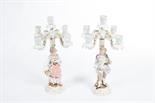 A PAIR OF ATTRACTIVE DRESDEN PORCELAIN FLOWER ENCRUSTED FIGURAL CANDELABRA,
each with four arms