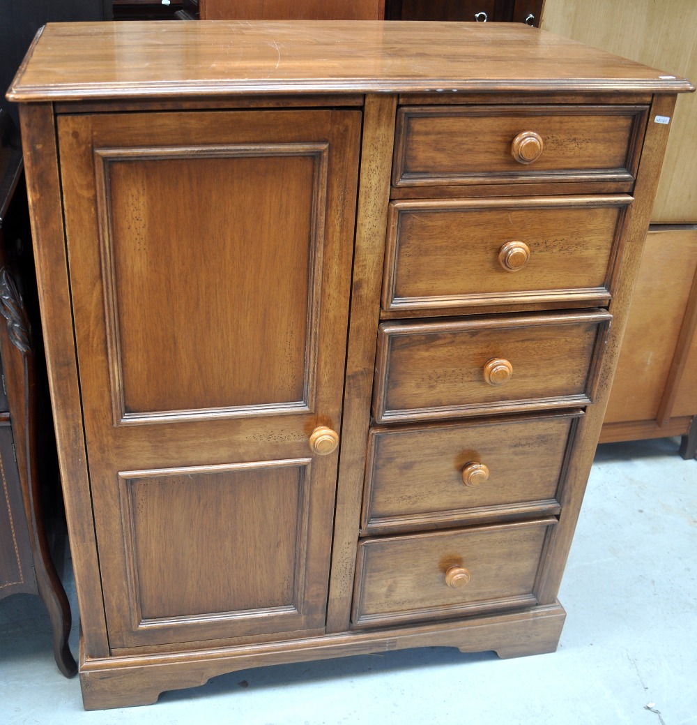 A Modern Combination Wardrobe Chest Of Drawers The Left Side With