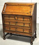 A mid 20th century oak bureau two over three drawers to base, 105 x 90cm.
