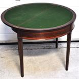 An Edwardian inlaid card table.