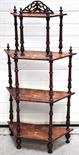 A Victorian walnut marquetry inlaid four-tiered what-not with ring turned supports, height 140cm.