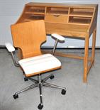 A contemporary John Lewis solid oak desk raised on square section legs, the open front containing