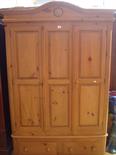 A pine triple wardrobe