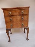 A mahogany bedside table