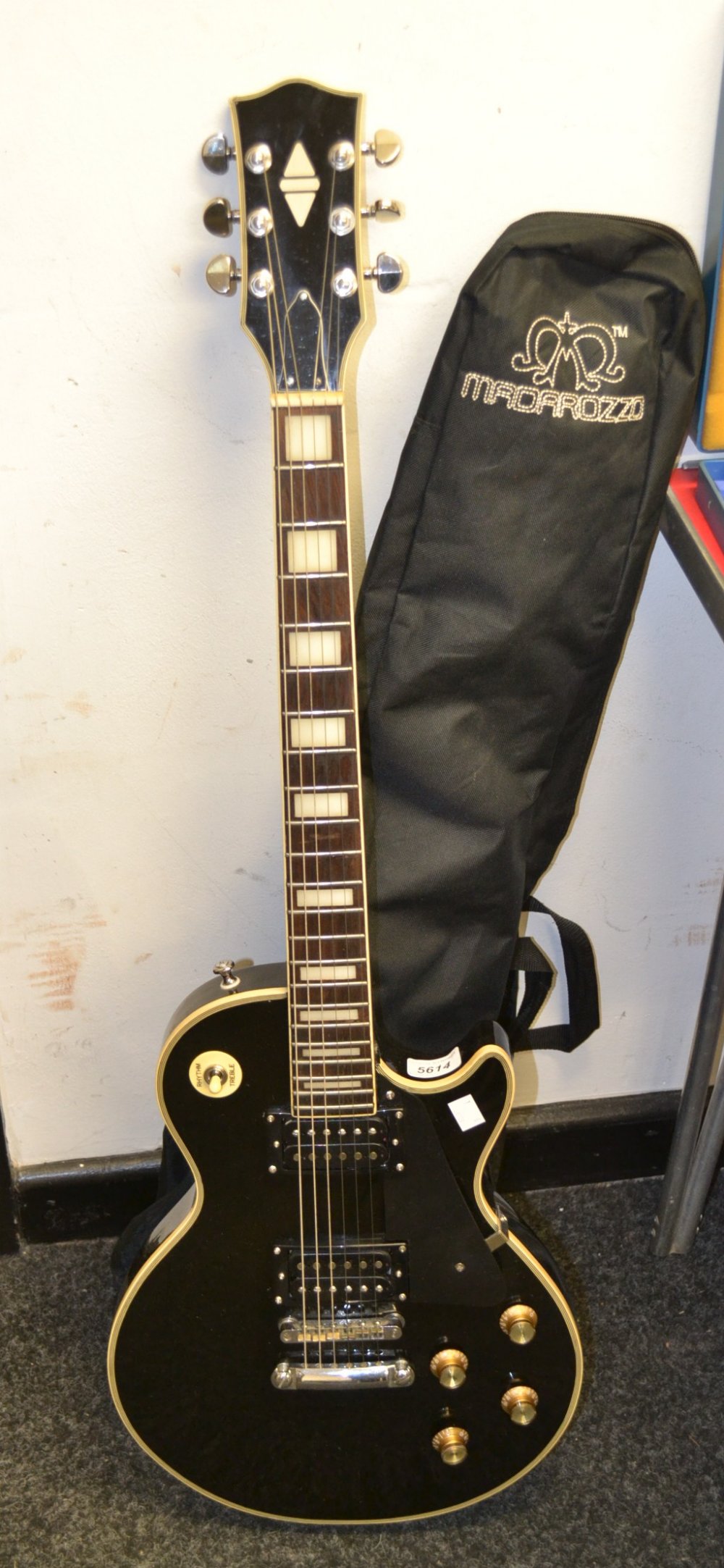 Kay 1970`s copy of Les Paul Black Beauty electric guitar in a soft case