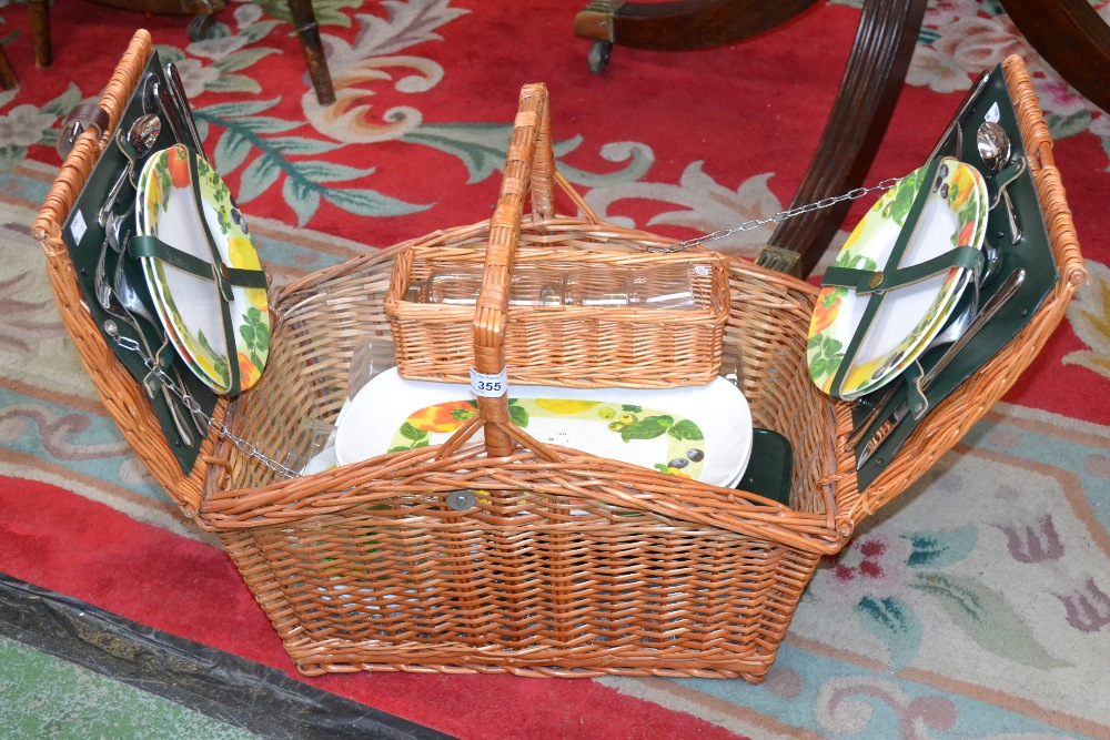 A John Lewis Partnership Optima four setting wicket picnic basket