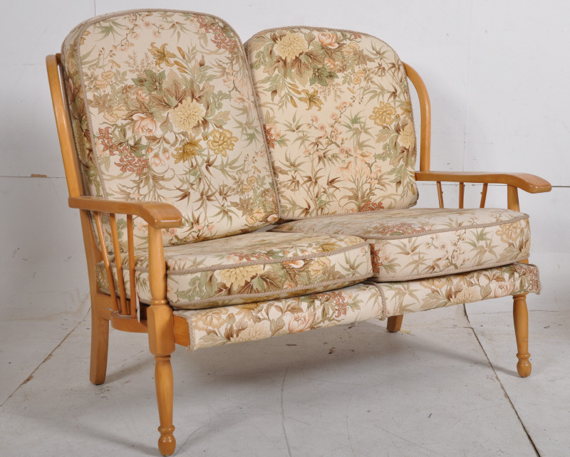 Lot 279 An Ercol Style Sofa In Beechwood Spindle Back Frame On Turned Legs Lot 279 An Ercol Style Sofa In Beechwood Spindle Back Frame On Turned Legs