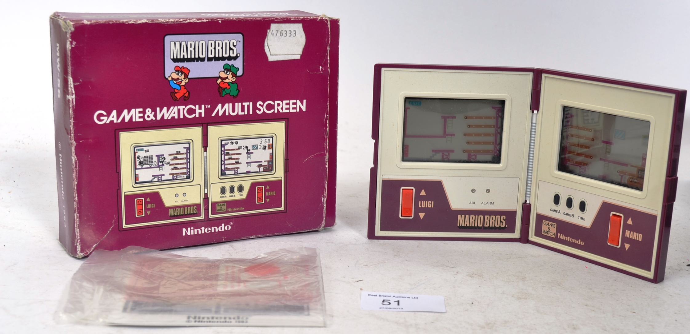 An original Nintendo Game & Watch Multiscreen Mario Bros handheld gaming console, complete with i An original Nintendo Game & Watch Multiscreen Mario Bros handheld gaming console, complete with i